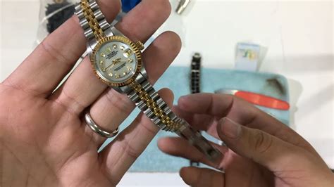 rolex watch how to open